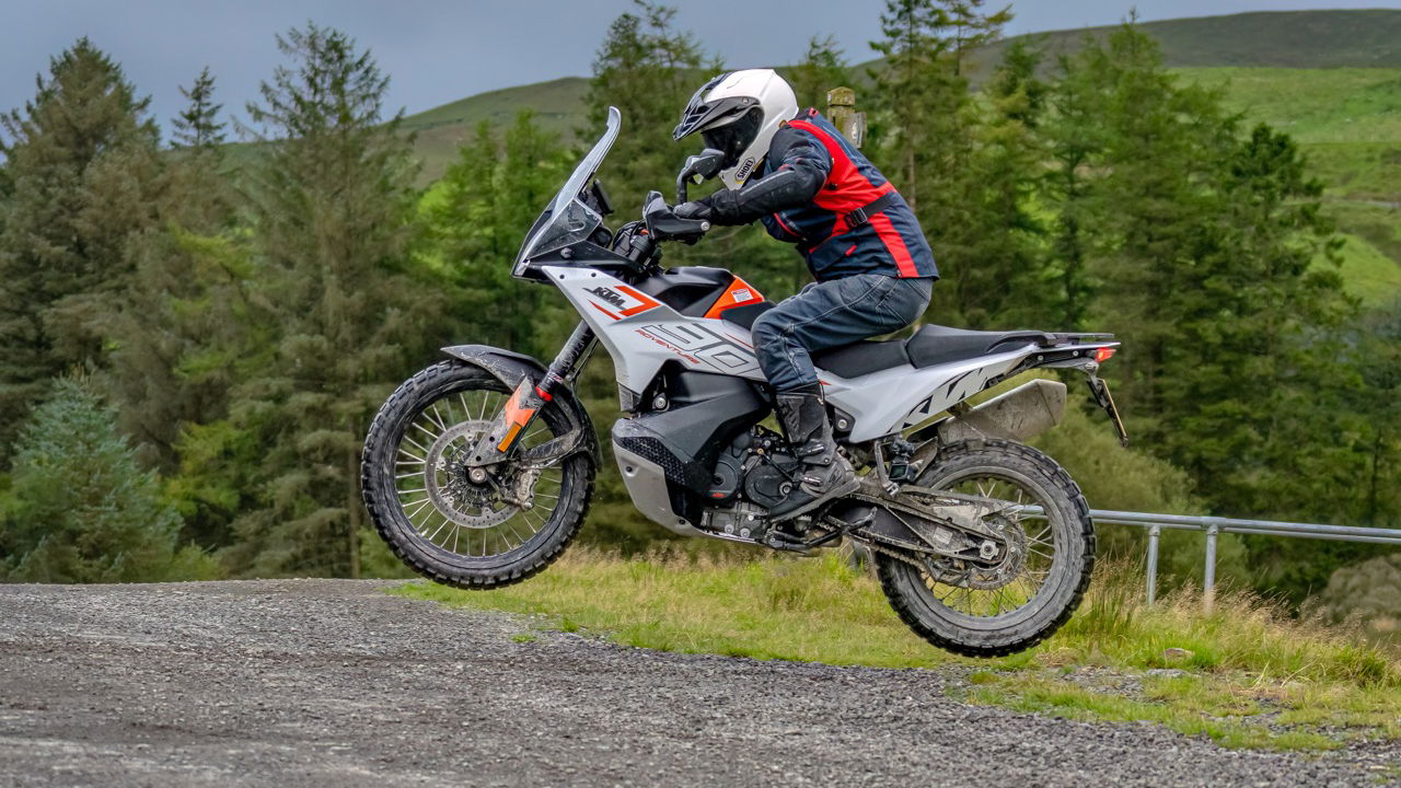 A 790 Adventure motorcycle jumping through the air